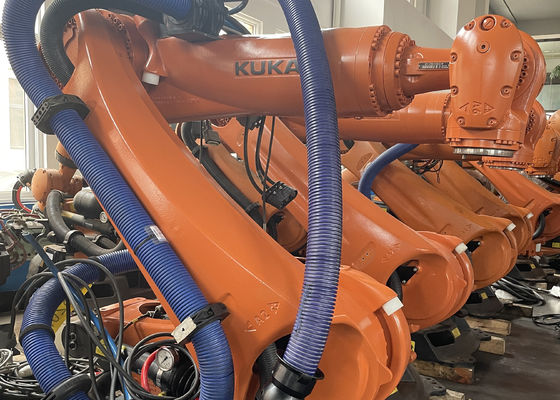 Robot Pemuatan Pemasangan Lantai dengan Kemungkinan Ulang ±0,1 mm Kinerja KUKA KR210 dengan 2700mm Ultra - jangkauan panjang, sepenuhnya dapat disesuaikan dengan aplikasi industri Penggilingan yang efisien dan Pelletizing yang sempurna